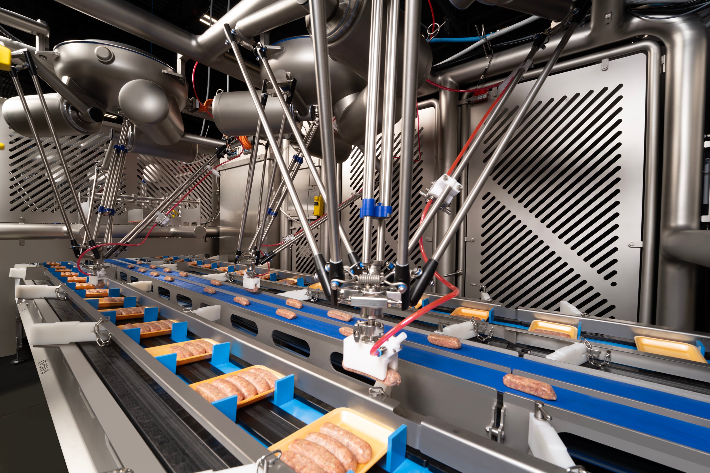 Robotic fresh meat packaging line