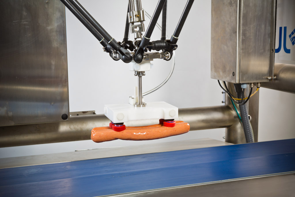 JLS delta robot loading a hot dog during a product test in the JLS FLIGHT LAB in York, Pennsylvania