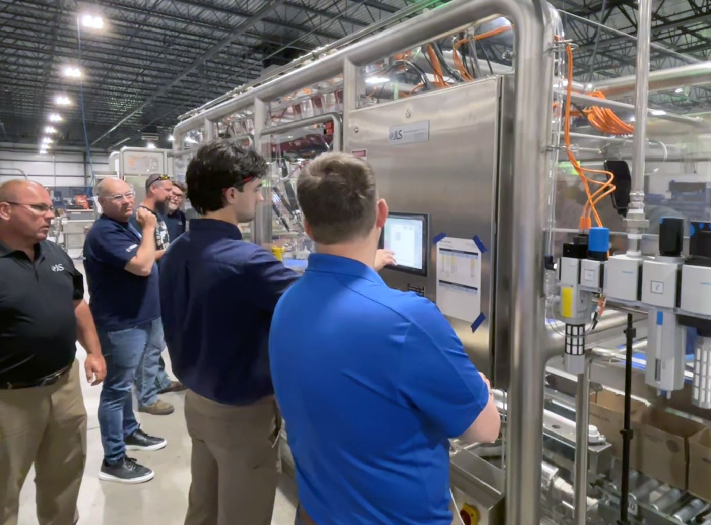 Stainless-steel JLS packaging system engineered for hygienic, high-pressure washdown environments